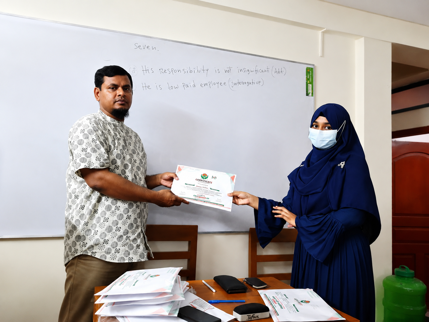 Tanjuma Orin holding certificate